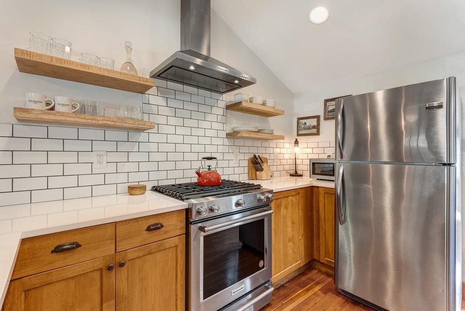 You'll love the modern kitchen and classic feel in this historic bungalow