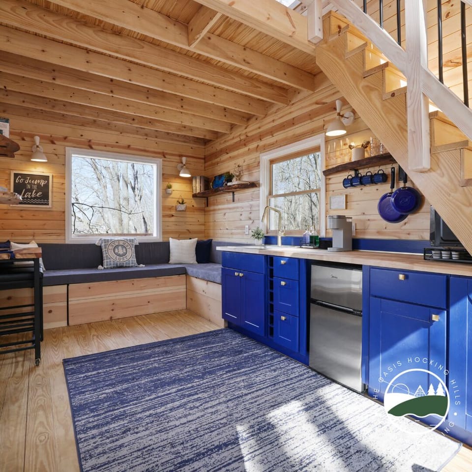 Main living space, complete with custom bench seating perfect for relaxing with a cup of coffee.