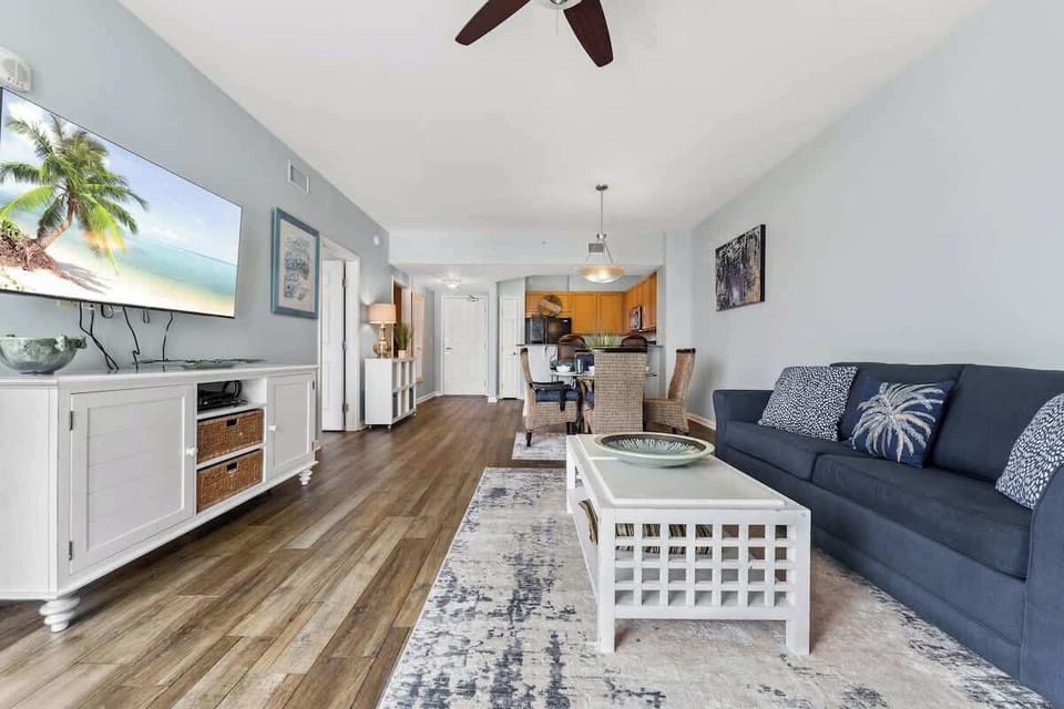 Spacious living room with sofa couch.