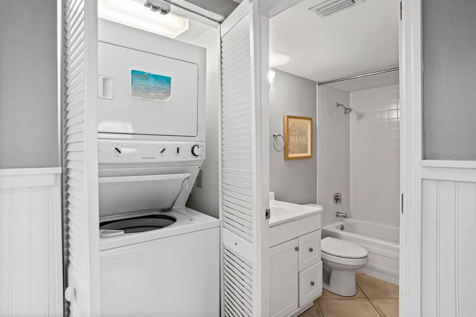 Bathroom w/ walk-in shower, sink, & simple layout for everyday comfort.