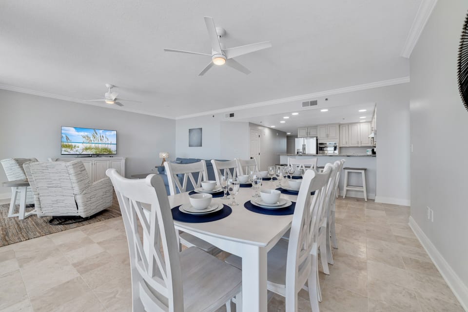 Gather and create memories in this beautifully appointed dining table for 8 plus 4 seats at the breakfast bar.