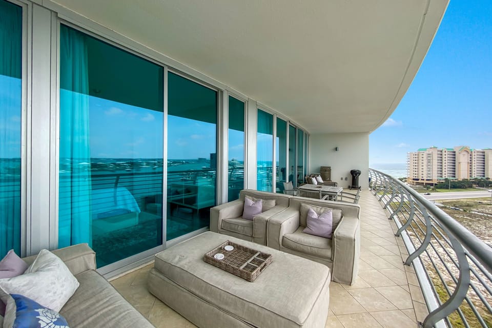 This architectural design seamlessly integrates indoor and outdoor living with a spacious balcony offering expansive water views. The perfect extension of the living space for enjoying the coastal ambiance.