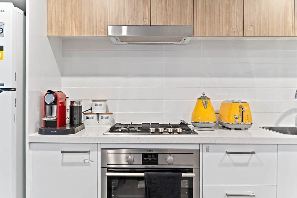 Modern Kitchen with Appliances and Professional Cookware