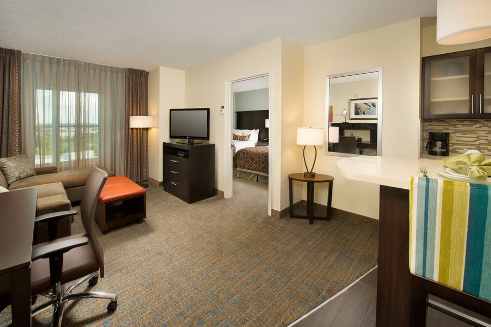 Suite, 1 Bedroom, Kitchen | Living area | TV, DVD player, books