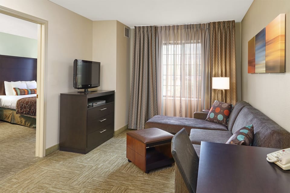 In-room safe, desk, iron/ironing board, cribs (free)