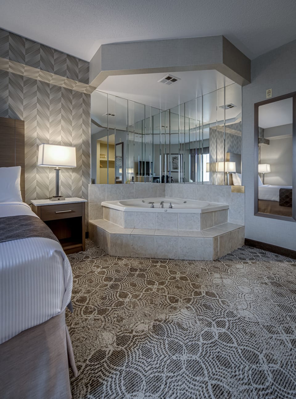 King Suite with Jetted Tub | Down comforters, in-room safe, desk, blackout drapes