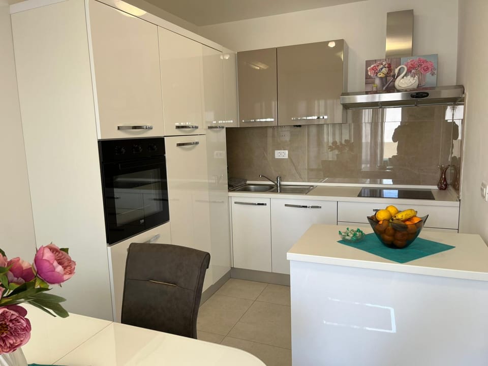 Superior Apartment, 1 Bedroom, Balcony, City View | Private kitchen | Fridge, oven, stovetop, dishwasher