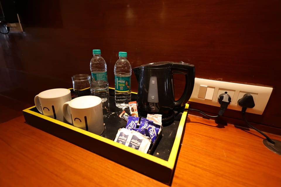 Deluxe Room | 1 bedroom, desk, laptop workspace, iron/ironing board