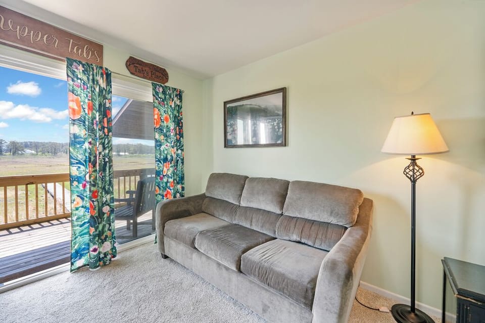Enjoy gorgeous Views of Eel Creek right from the sofa!