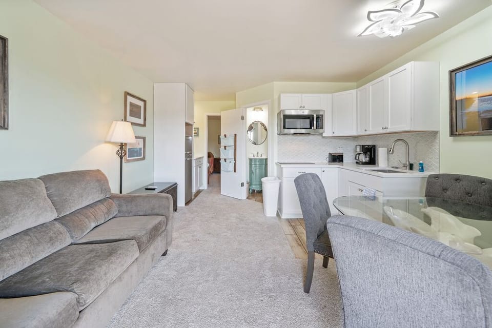 Everything you need for a great Beach Getaway. Sleeper Sofa in Living Room.