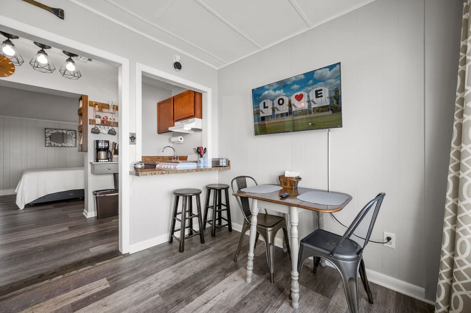 Dine with amazing water views - 2 Flat Screen Cable TVs, as well!