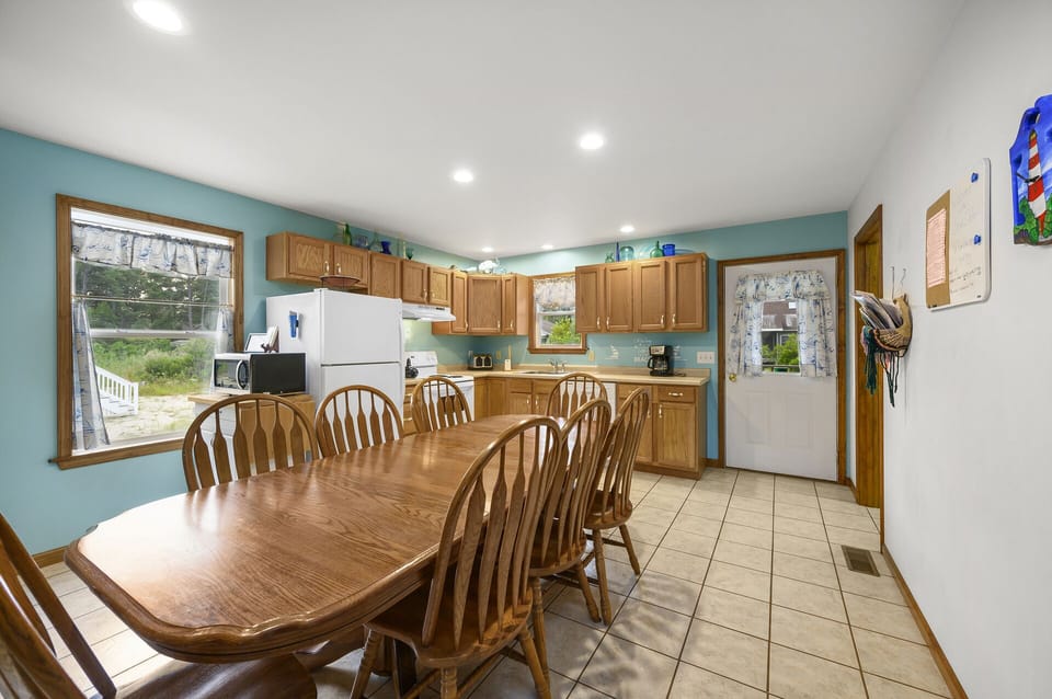 Share stories of the day's adventures around the huge dining table.