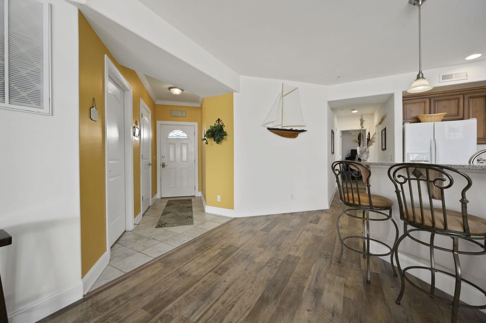 Warm Colors and Beachy Flooring reminiscent of a Boardwalk.