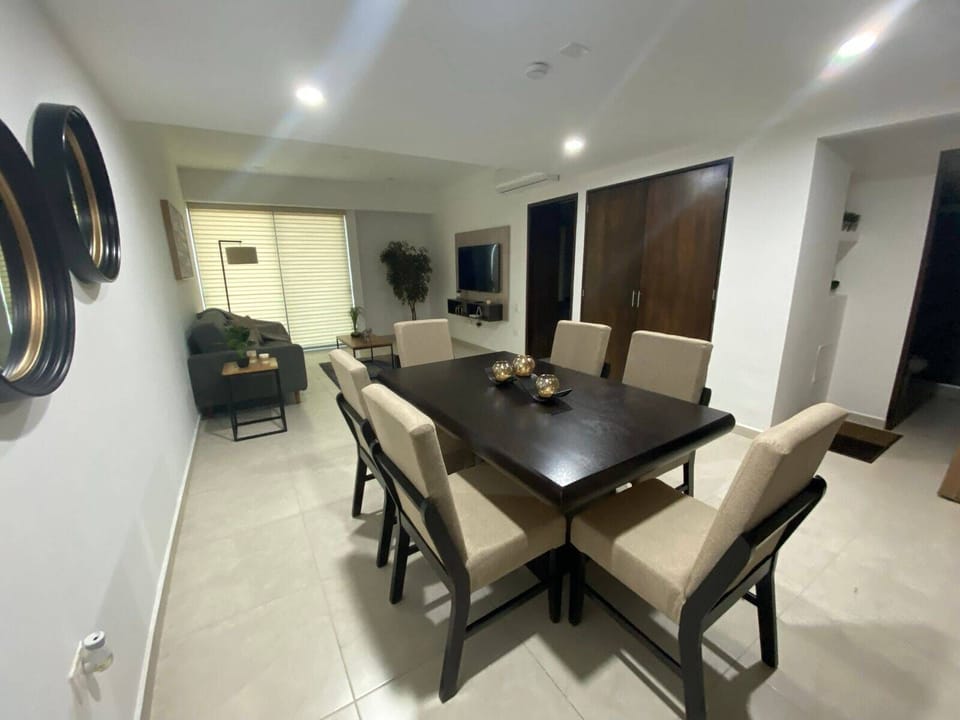 Comfort Condo | Private kitchen | Cookware/dishes/utensils, dining tables