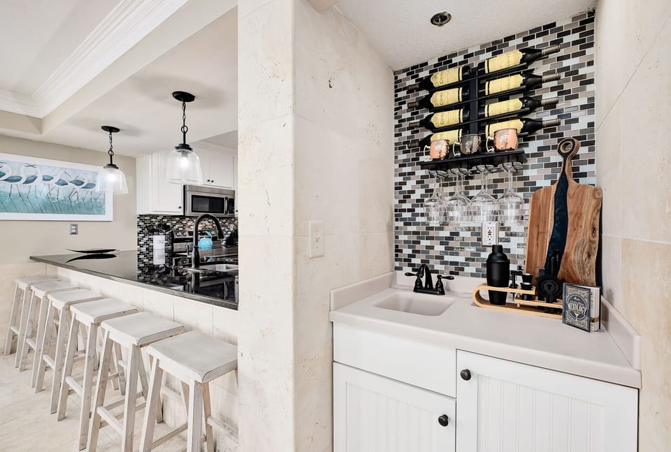 Bar top stools with wine bar.
