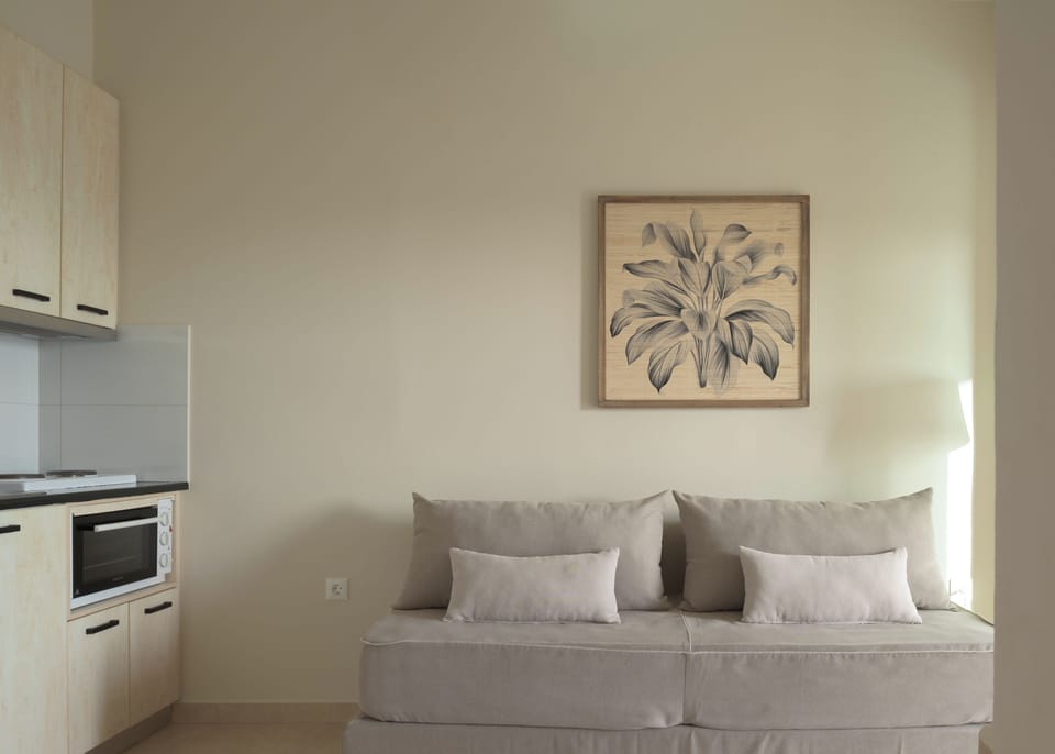 Junior Suite, 1 Bedroom | Living area | Flat-screen TV