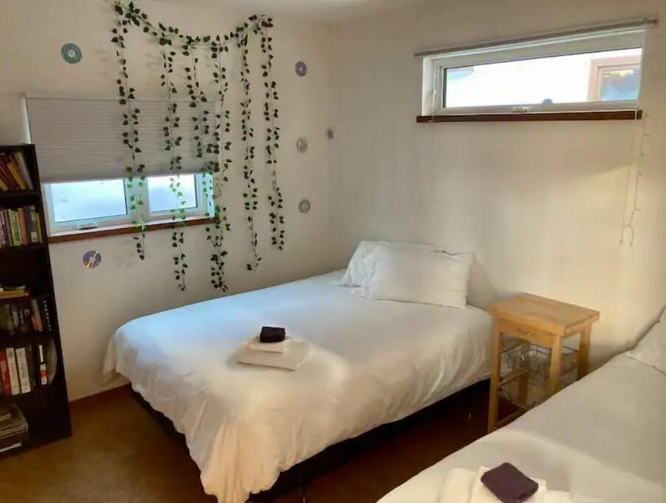 Queen and Twin XL in this bedroom can house several configurations of guests.