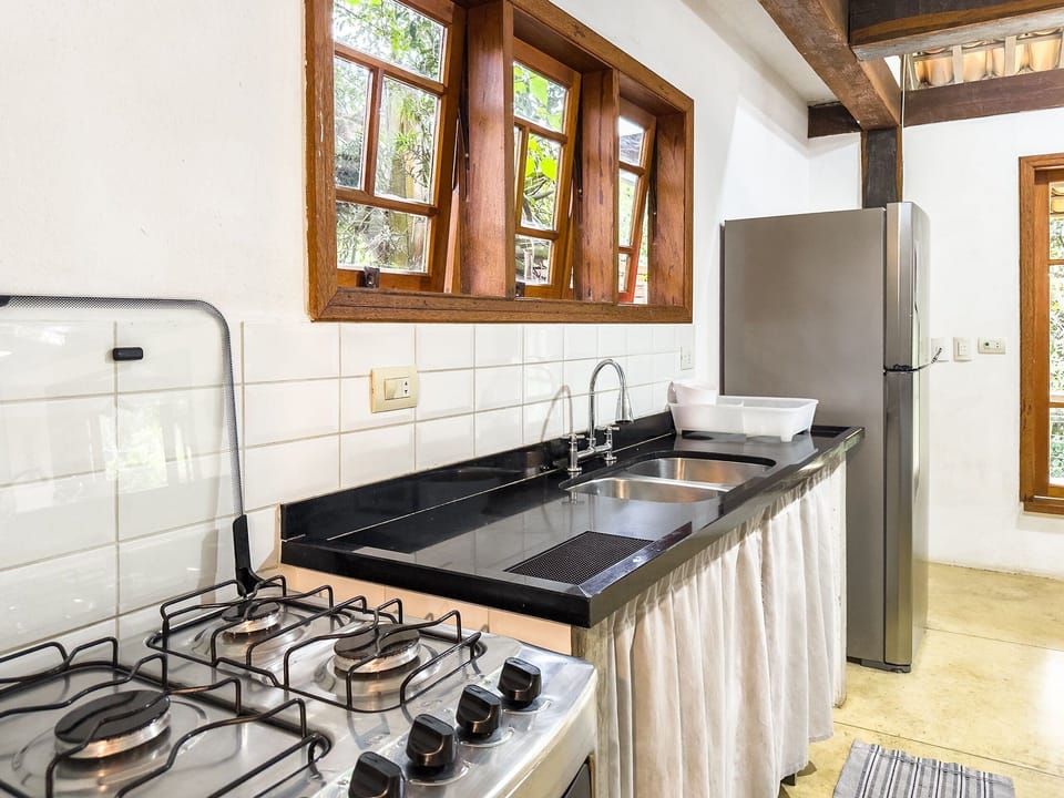 Basic Villa | Private kitchen | Microwave, dining tables