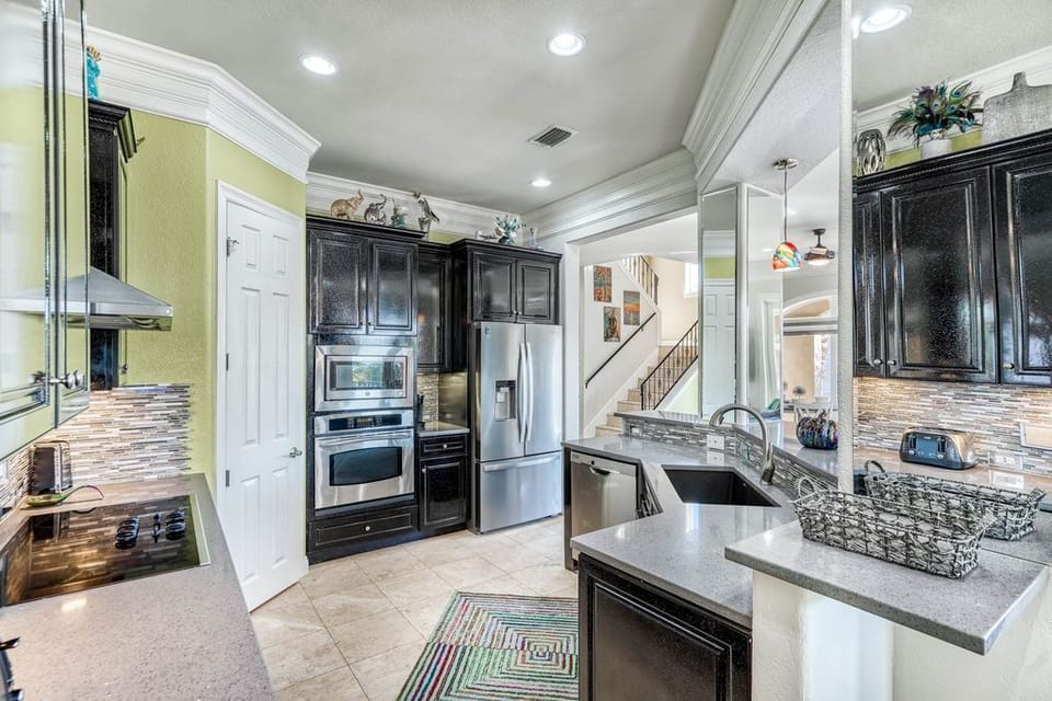 Your gourmet kitchen awaits with granite countertops, stainless steel appliances, and everything you need to create memorable meals.