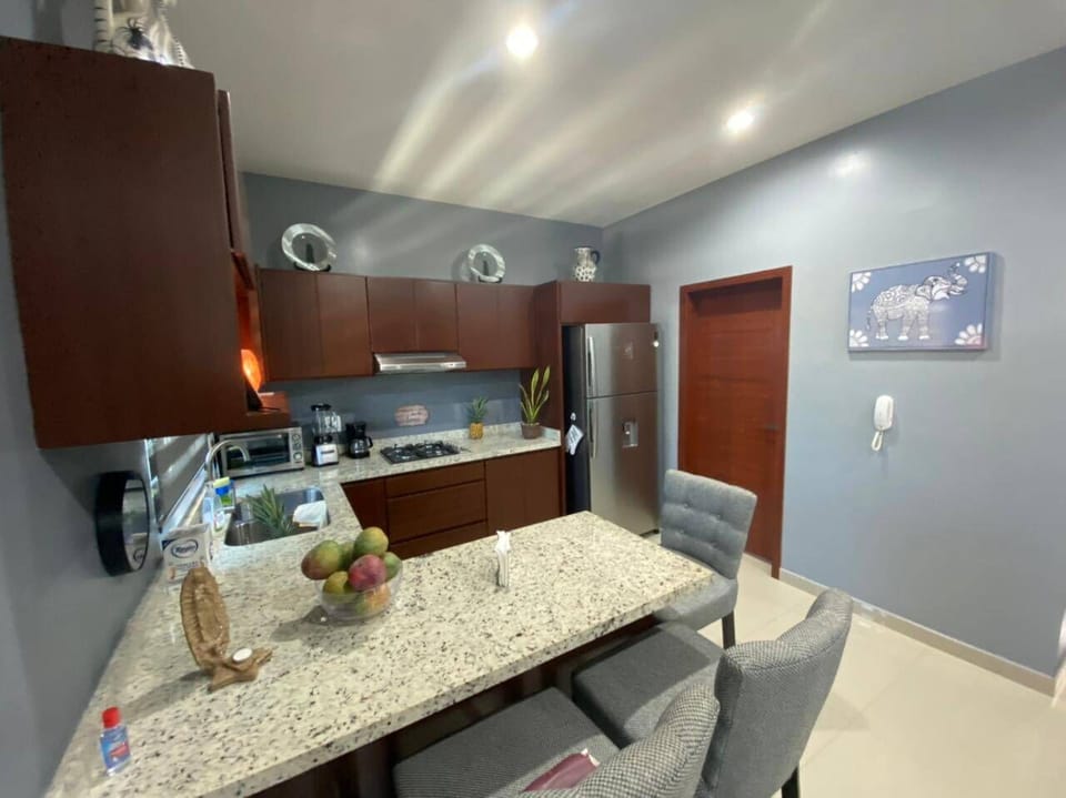 Family Condo | Private kitchen | Cookware/dishes/utensils, dining tables