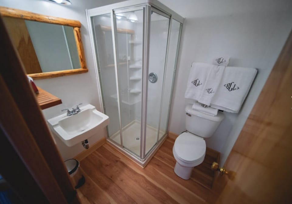 Bathtub, designer toiletries, towels, soap