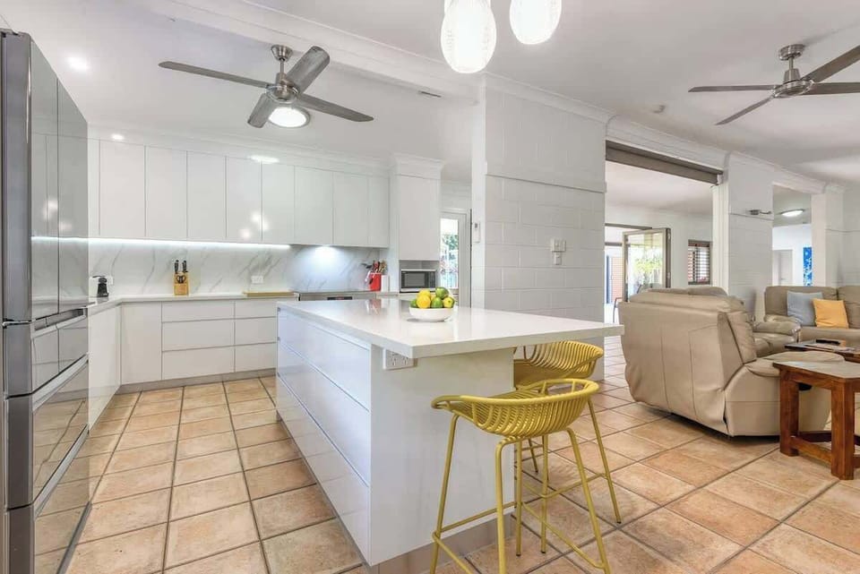 Gather around the central island for chats with the cook while they do their thing in the kitchen.