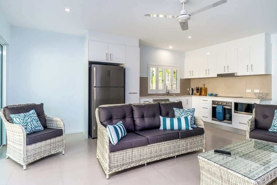 The kitchen within the open-plan living area makes it easy to enjoy home-cooked meals while staying in