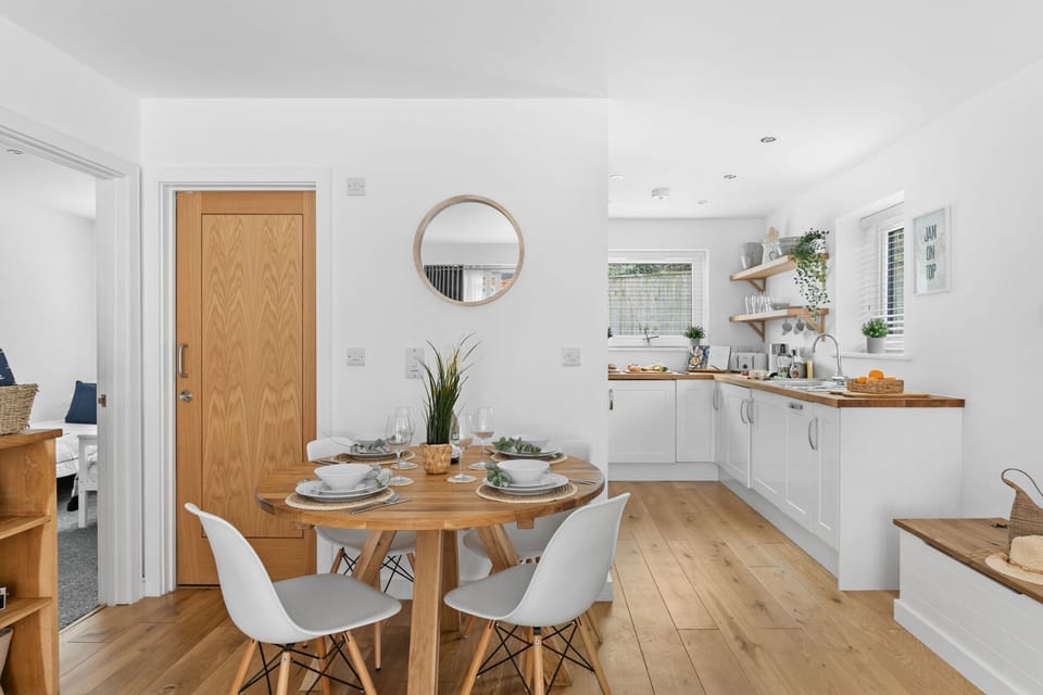 Round dining table next to the kitchen - Plover 1, The Cove