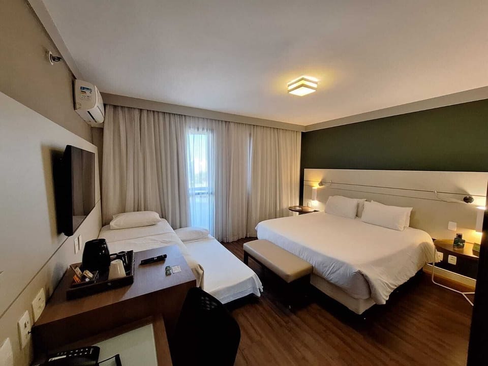 Luxury Quadruple Room | Minibar, in-room safe, blackout drapes, soundproofing