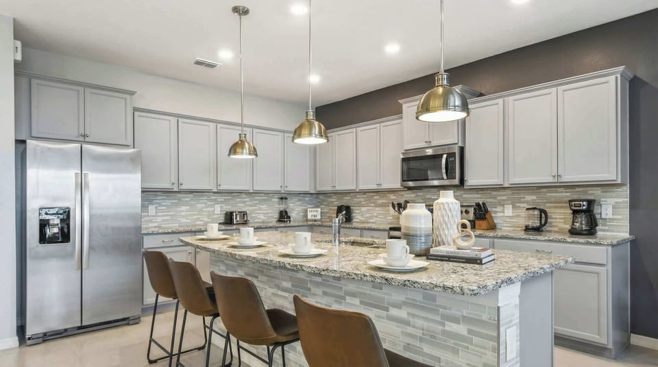 Modern kitchen with stylish seating, perfect for your next culinary adventure.