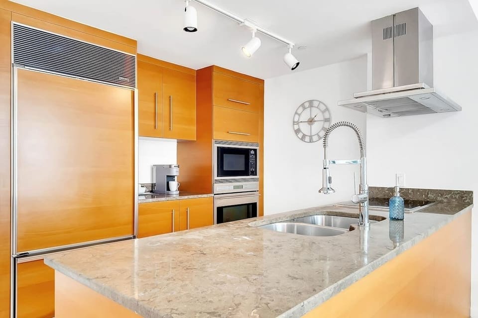 Gourmet kitchen island with high-end appliances.