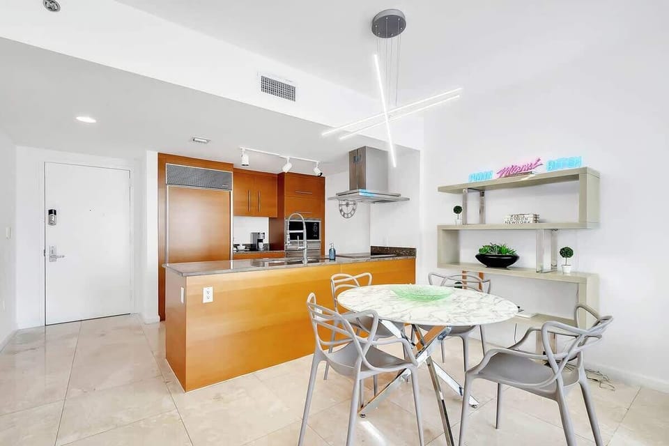 Sleek, modern kitchen with premium wood finishes.