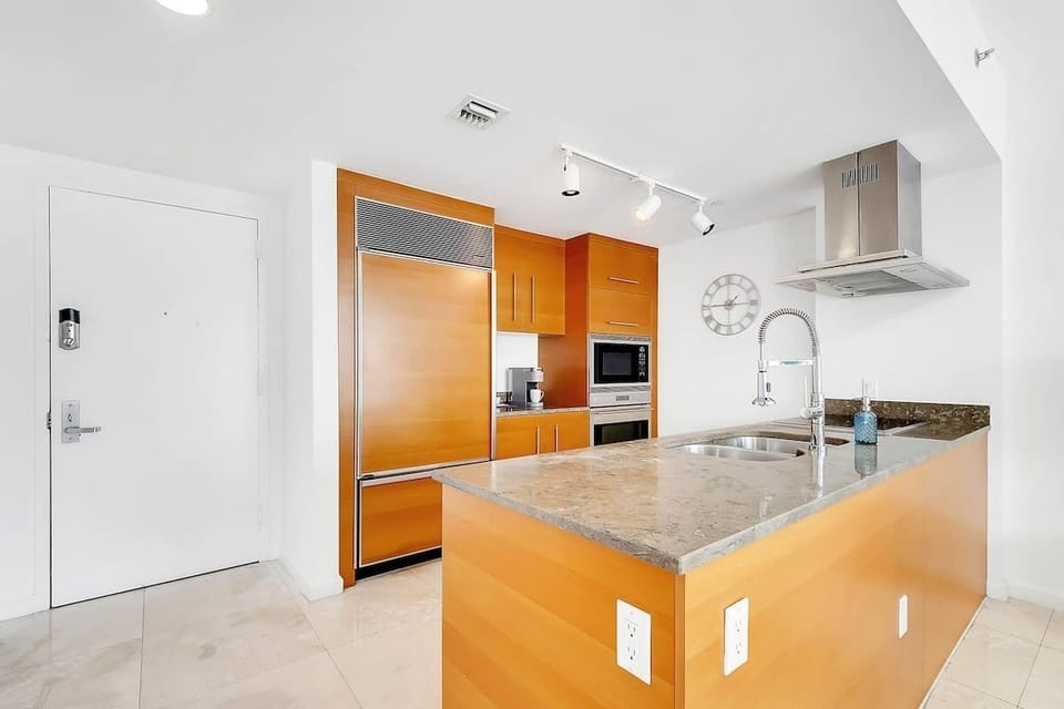 Modern kitchen layout with ample storage.