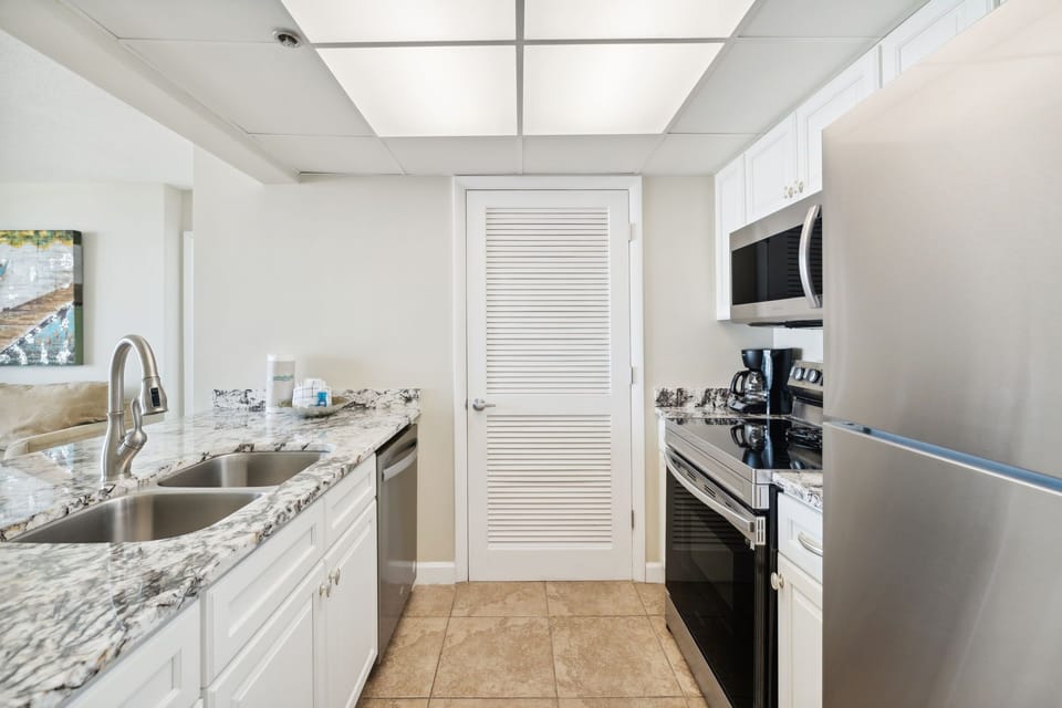 Fully Stocked kitchen with Bar Seating