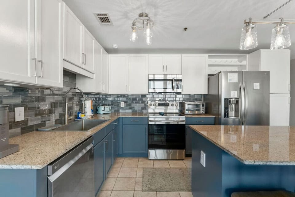 Full Size Kitchen with Ocean Views and Island Bar Seating