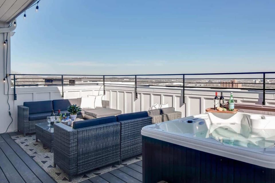 Stunning city views from the rooftop with a hot tub.