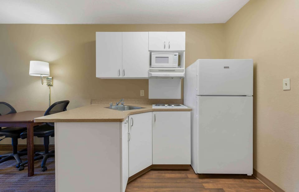 Studio, 2 Double Beds, Non Smoking | Desk, laptop workspace, blackout drapes, iron/ironing board