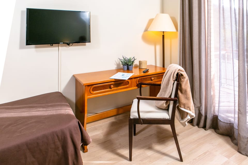Desk, free WiFi, bed sheets