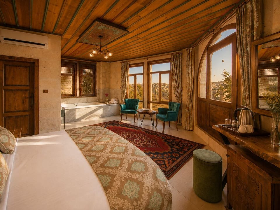 Panoramic Terrace Suite with Jacuzzi | 1 bedroom, minibar, desk, blackout drapes