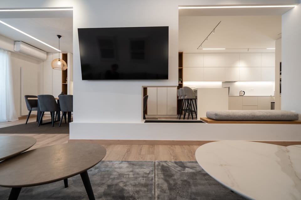 Luxury Apartment | Living area | 65-inch Smart TV with cable channels, TV