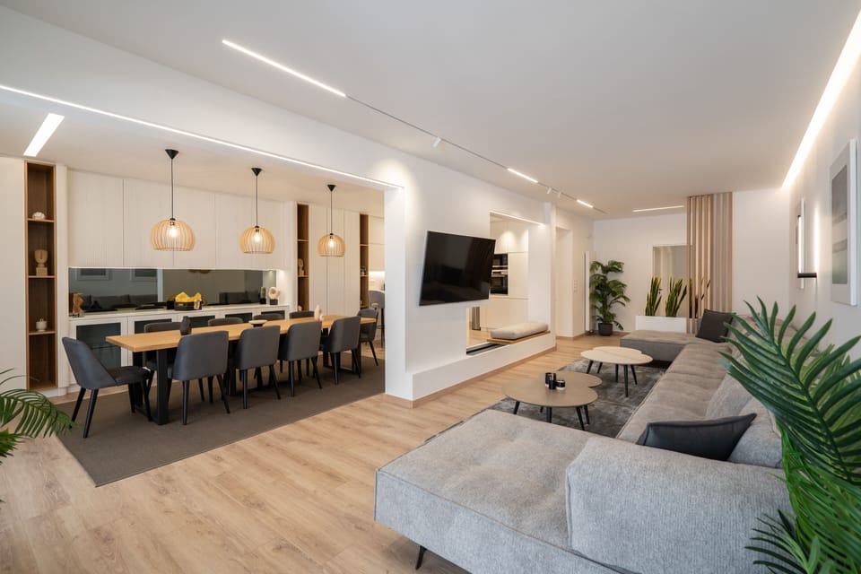 Luxury Apartment | Living area | 65-inch Smart TV with cable channels, TV