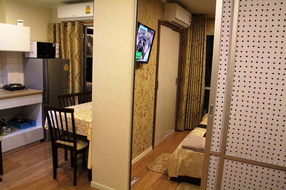 Apartment, 1 Bedroom | Living area | Flat-screen TV, DVD player