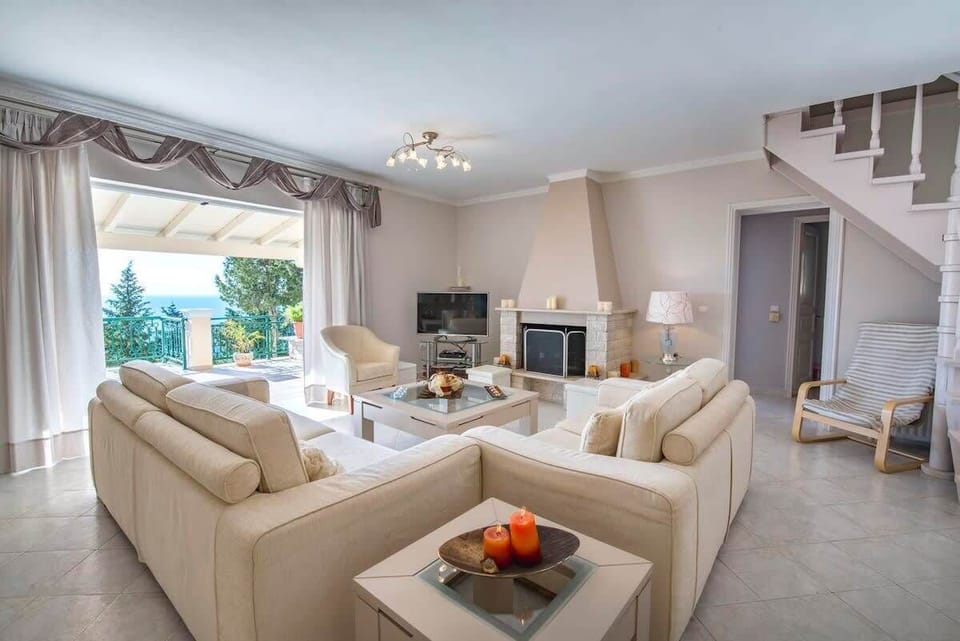 A spacious living room, where light gracefully enchants every corner