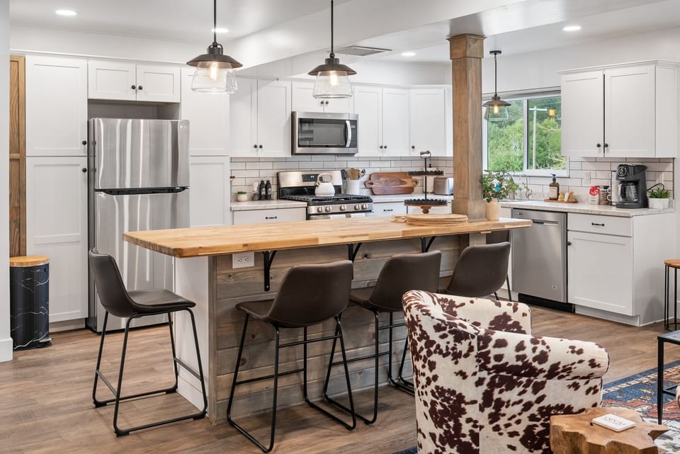 Kitchen/Dining - Butcher Block Island with extra space for cooking or sitting and sipping