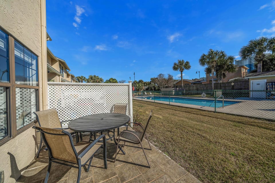 Sit on the patio and enjoy a meal or a cold beverage while the kids splash in the pool!