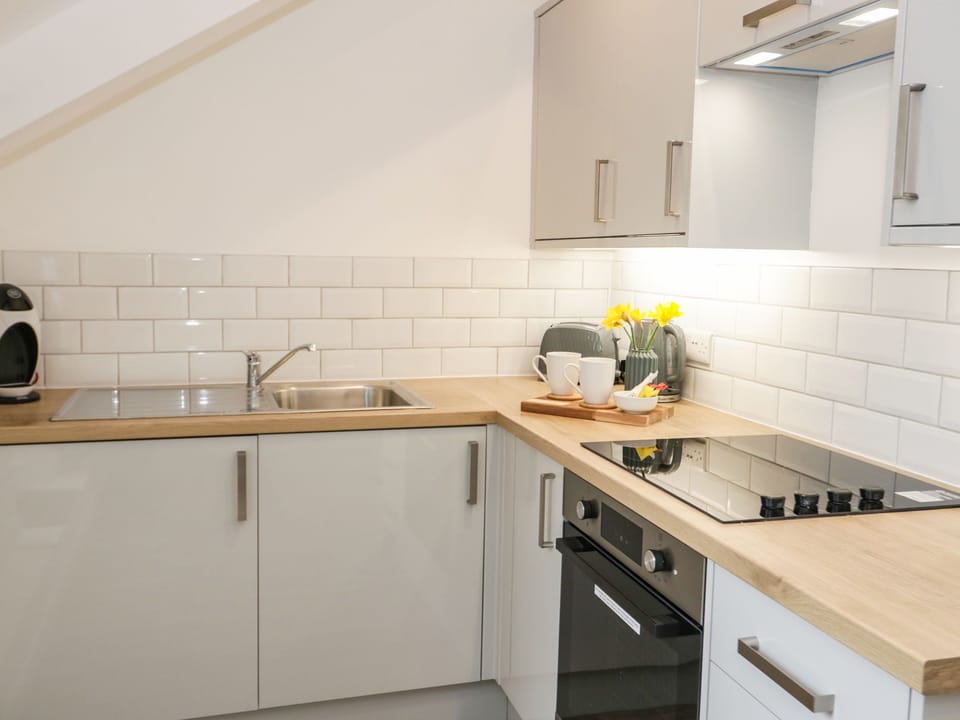 Fridge, electric kettle, toaster, cookware/dishes/utensils