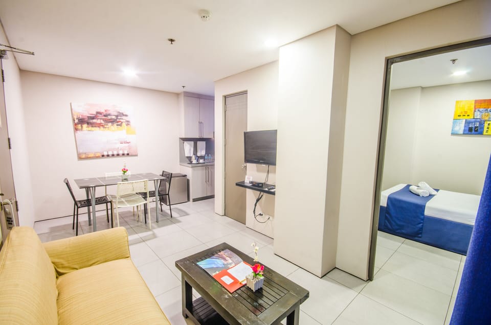 Executive Suite, 1 Bedroom | Individually furnished, desk, iron/ironing board, free WiFi