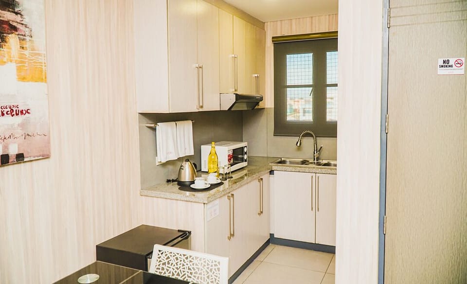 Executive Suite, 1 Bedroom | Individually furnished, desk, iron/ironing board, free WiFi
