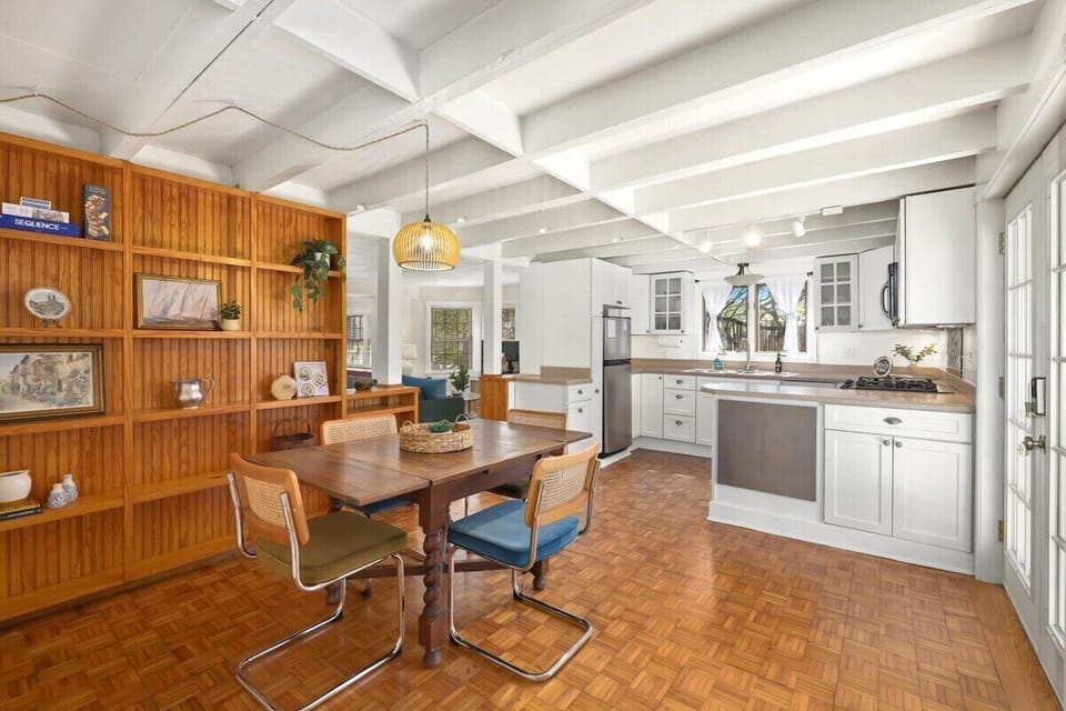 Walk through the main living room to access our kitchen and dining area.