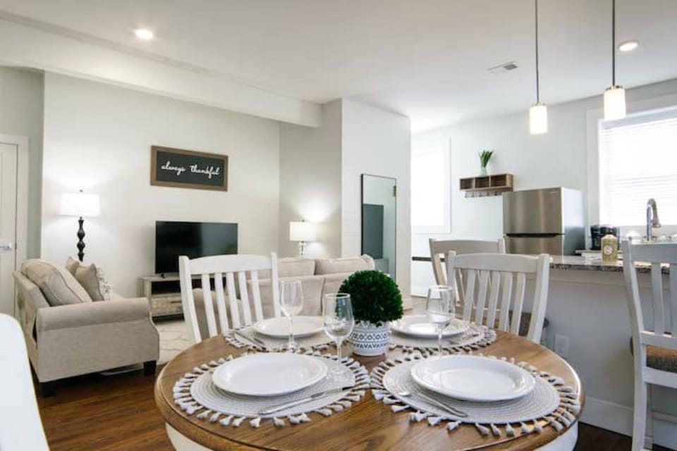 Wonderful open concept apartment. Kitchen, dining, and living area.